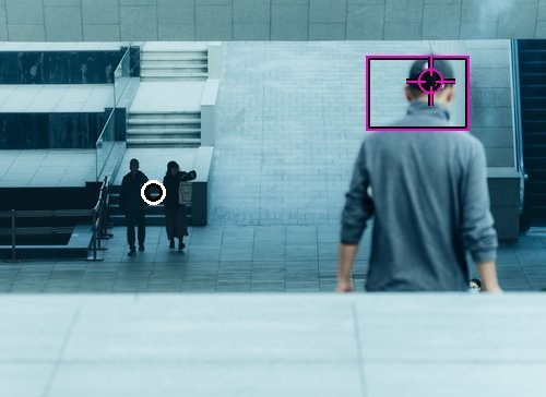 Photo 1 with the grid answer marked on the man and my point on the two small figures.